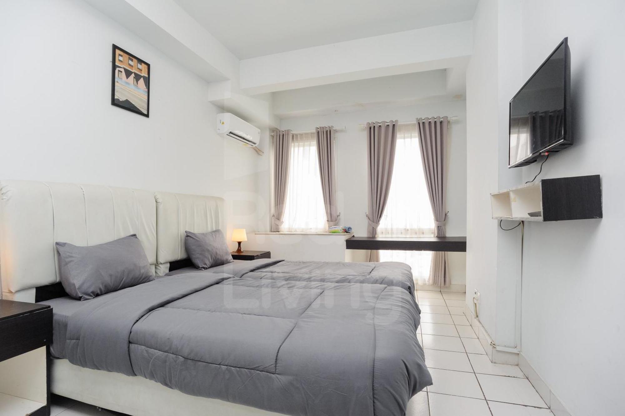 Redliving Patra Land Urbano - Alfa Tower East Apartemen